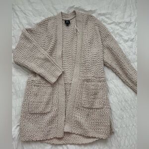 Soft, cream carding, long and warm